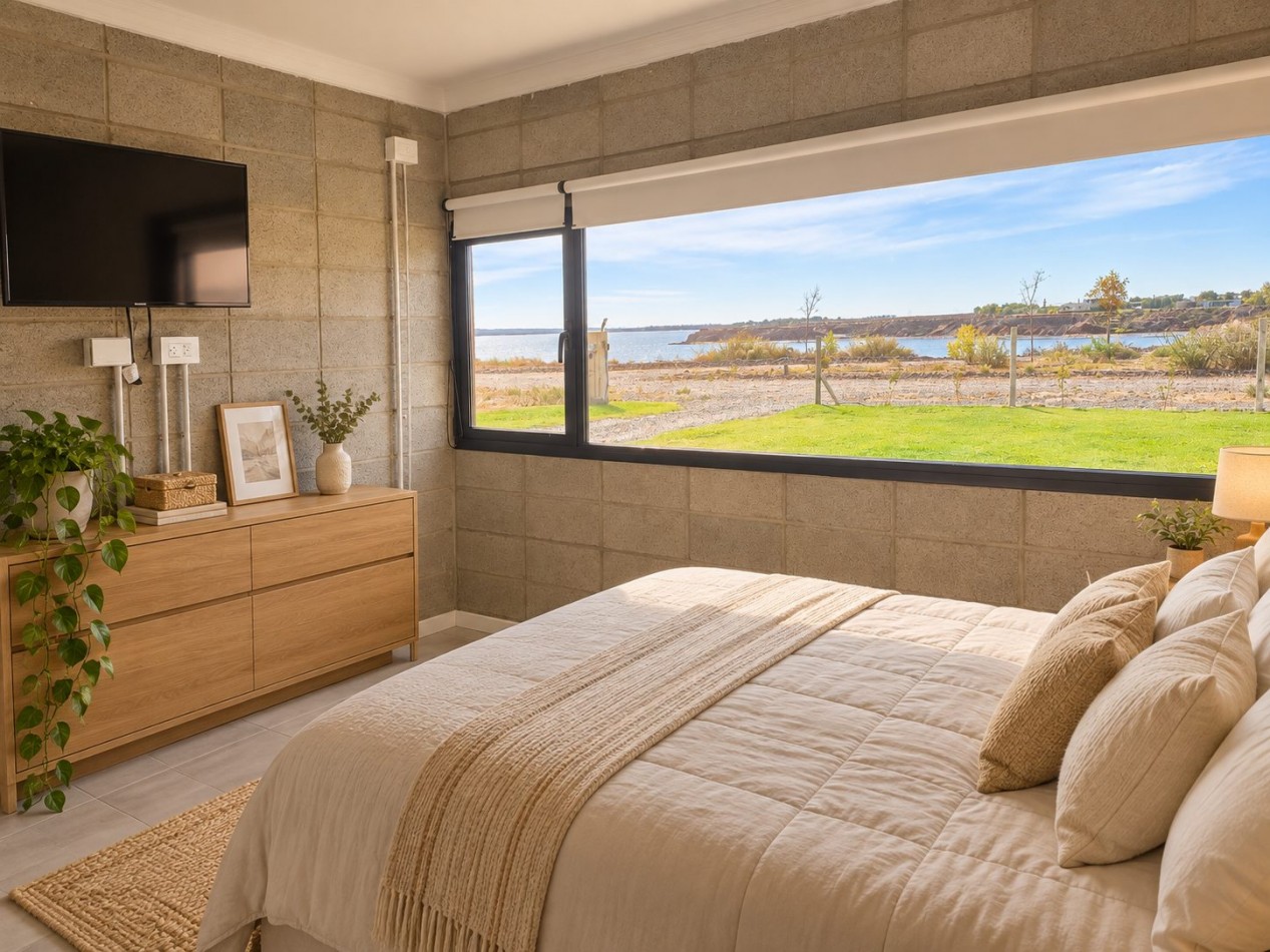 VENTA HERMOSA CASA DE DOS DORMITORIOS EN VILLA TENIS CLUB MARI MENUCO CON VISTA DIRECTA AL LAGO- NEUQUEN 